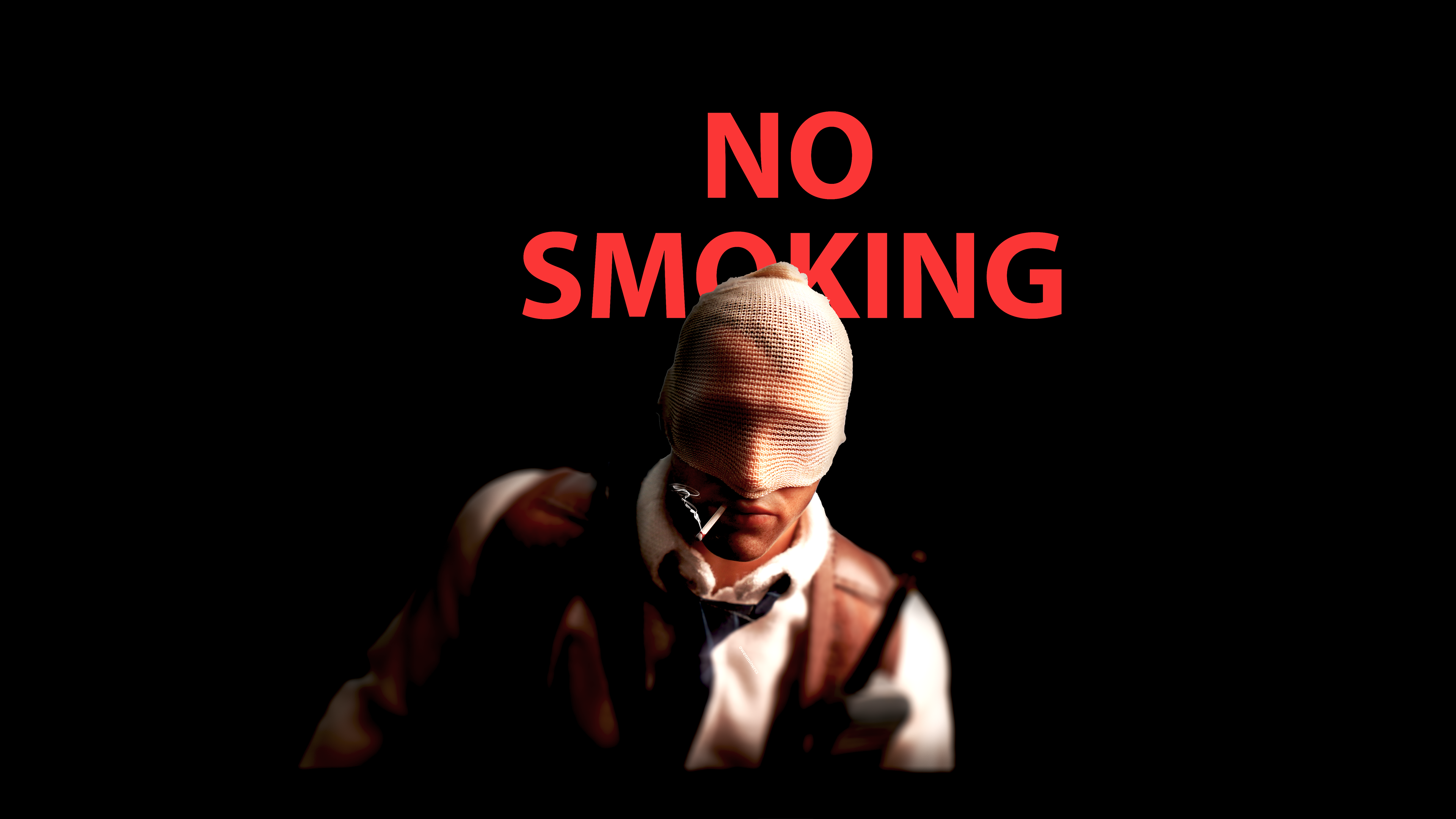 Agent number K figurine with text no smoking behind his face while smoking a cigarette. Black background